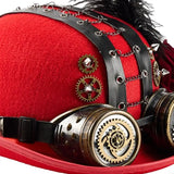 Chapeau Melon Steampunk Rouge avec Goggles, orné de brides en cuir noir, chaînes métalliques, pointes, engrenages et lunettes vintage avec rouages en laiton.